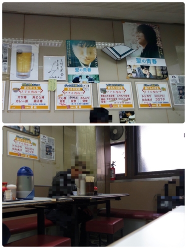 聖の青春のポスターと松山ケンイチのサインと村山聖さんが座っていた